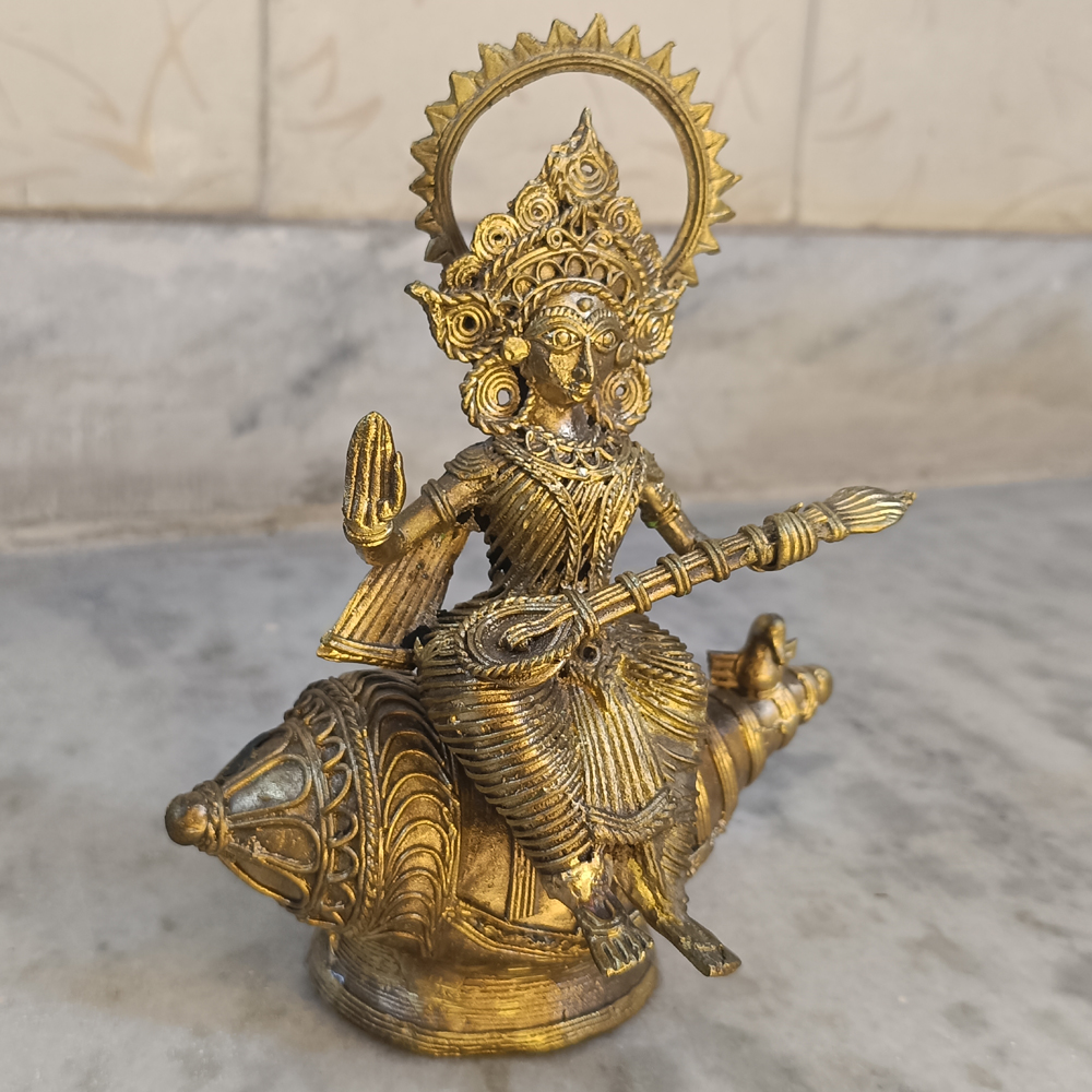 Antique Metallic Dhokra Goddess Saraswati Seated on Shankha Figurine