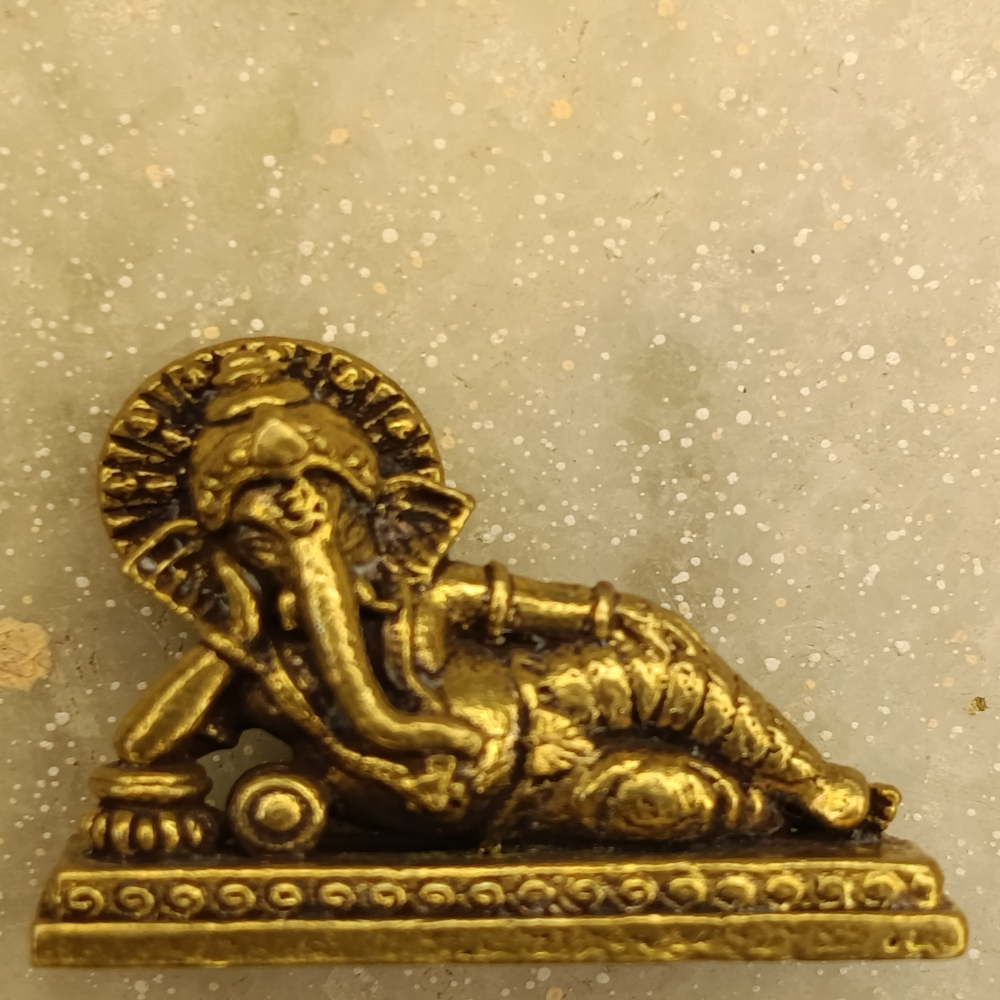 Divine Reclining Ganesha-Handcrafted Brass Masterpiece | Puja rooms,office desks,...